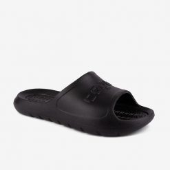 Klapki damskie Coqui Viki - czarne Coquiair. Czarne klapki Coqui, bez wzorów, z materiału, bez obcasa. Za 125.99 zł.
