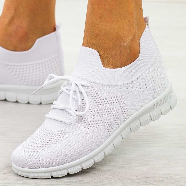 Białe sportowe buty damskie Potocki 16329. Białe obuwie sportowe POTOCKI, na lato, z dresówki, bez zapięcia, do biegania. Za 89.00 zł.