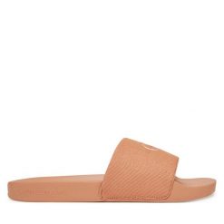Klapki Calvin Klein Jeans. Pomarańczowe klapki Calvin Klein Jeans, bez wzorów, z jeansu, bez obcasa. Za 119.99 zł.