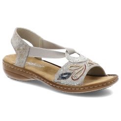 Srebrne Sandały Rieker Wsuwne Obuwie Damskie Z Eleganckimi Dodatkami. Szare sandały Rieker, bez wzorów, z materiału, eleganckie, bez obcasa, bez zapięcia. Za 269.99 zł.