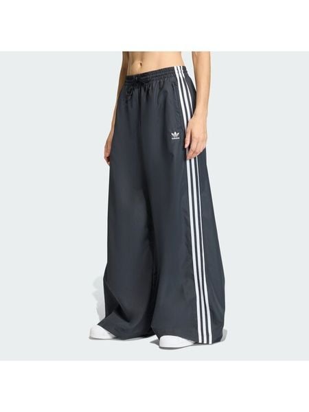 Adidas Spodnie dresowe Firebird Adilenium KD2914 Czarny Regular Fit. Czarne spodnie dresowe Adidas, l, bez wzorów, z dresówki. Za 359.99 zł.