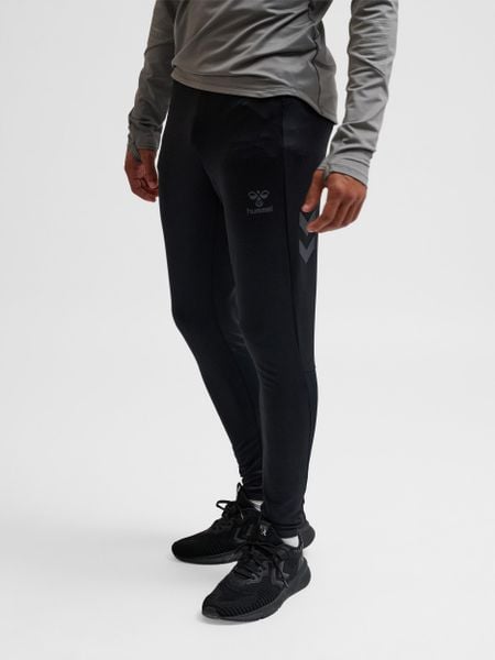 Legginsy Hummel Pro. Czarne legginsy Hummel, m, bez wzorów, z materiału, z standardowym stanem, na fitness i siłownię. Za 236.50 zł.