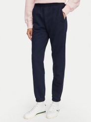 Lacoste Spodnie dresowe XF5268 Granatowy Regular Fit. Niebieskie spodnie dresowe Lacoste, bez wzorów, z bawełny. Za 549.99 zł.