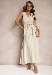 Beżowa Koktajlowa Sukienka Plisowana z Kwiatową Broszką Paskiem i Gumką w Talii Viknna. Brązowe sukienki Renee, na imprezę, l, bez wzorów, z materiału, eleganckie, bez kołnierzyka, bez ramiączek, maxi, plisowane. Za 69.99 zł.