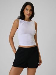 4F Top slim z modalem damski - biały L. Białe topy 4f, l, bez wzorów, z dzianiny, bez kołnierzyka, bez ramiączek. Za 49.99 zł.
