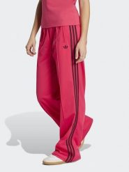Adidas Spodnie dresowe w kolorze różowym rozmiar: M. Różowe spodnie dresowe Adidas, m, bez wzorów, z dresówki. Za 209.95 zł.