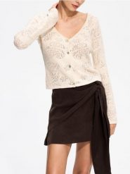Crochetowy kardigan w autorski wzór - kremowy. Białe kardigany Reserved, l, bez wzorów, z bawełny. Za 279.99 zł.