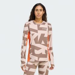 Koszulka z długim rękawem Multi Synthetic Base Layer. Brązowe bluzki Adidas, uniwersalny, bez wzorów, sportowe, bez kołnierzyka, bez ramiączek. Za 219.00 zł.