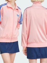 Adidas Kurtka sportowa "Firebird" w kolorze jasnoróżowym rozmiar: XS. Różowe kurtki sportowe Adidas, xs, bez wzorów, bez kaptura, outdoorowe. Za 122.67 zł.