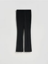 Legginsy z rozcięciami - czarny. Czarne legginsy Reserved, l, bez wzorów, z dzianiny. Za 89.99 zł.