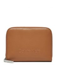 Calvin Klein Portfel Embossed Logo Zip Md K60K612437 Brązowy. Brązowe portfele Calvin Klein, bez wzorów, ze skóry. Za 279.99 zł.