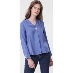 Niebieska Koszula Repetitive. Niebieskie koszule Born2be, l, z aplikacjami, z jeansu, eleganckie, bez kołnierzyka, bez ramiączek. Za 89.99 zł.
