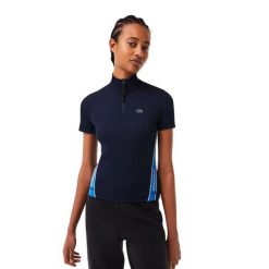 Koszulka damska Lacoste Contrast Bands Zip Neck Polo. Niebieskie koszulki polo Lacoste, m, bez wzorów, z dresówki, bez kołnierzyka, bez ramiączek. Za 357.00 zł.
