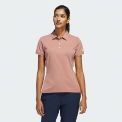 Koszulka Ultimate365 Tour Twistknit Polo. Czerwone koszulki polo Adidas, bez wzorów, z materiału, bez kołnierzyka, bez ramiączek. Za 349.00 zł.