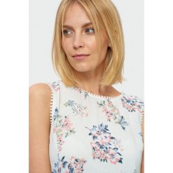 Wzorzysta bluzka z koronką. Bluzki marki Greenpoint. Za 79.99 zł.
