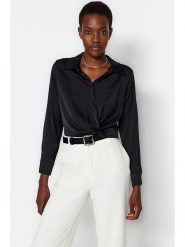 Trendyol Bluzka w kolorze czarnym rozmiar: 40. Czarne bluzki Trendyol, bez wzorów, bez kołnierzyka, bez ramiączek. Za 73.99 zł.