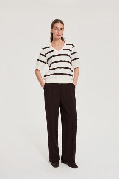 Bluza w paski z krótkimi rękawami biała. Białe bluzy MOODO, l, bez wzorów, z bawełny, bez kaptura. Za 89.99 zł.