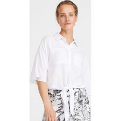 Gładka koszula z wiskozy - Biały. Białe koszule Reserved, bez wzorów, z wiskozy, bez kołnierzyka, bez ramiączek. Za 79.99 zł.