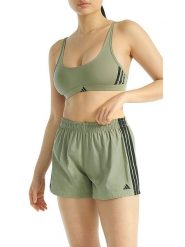 Adidas Szorty w kolorze zielonym rozmiar: S. Zielone szorty Adidas, bez wzorów, z bawełny. Za 65.38 zł.