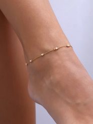 Luja Bijoux Pozłacana bransoletka z kryształami na kostkę rozmiar: onesize. Czerwone bransoletki Luja Bijoux, z kryształem, pozłacane. Za 55.45 zł.