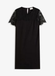 Sukienka z dżerseju z koronką. Czarne sukienki bonprix, bez wzorów, z dżerseju, eleganckie, bez kołnierzyka, bez ramiączek. Za 77.99 zł.