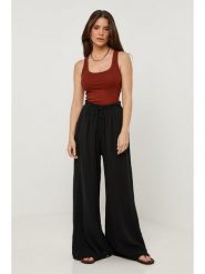 Lin Passion Lniane spodnie w kolorze czarnym rozmiar: 36/38. Czarne spodnie materiałowe Lin Passion, bez wzorów, ze lnu, z standardowym stanem. Za 108.99 zł.
