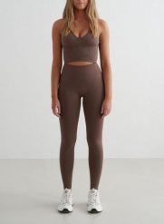 Damskie legginsy bezszwowe, wysoki stan, squat proof petite Shape brąz macchiato. Brązowe legginsy AIM'N, s, bez wzorów, z elastanu, z podwyższonym stanem. Za 297.00 zł.