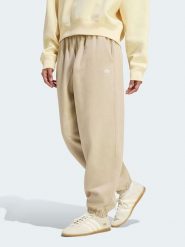 Adidas Spodnie dresowe w kolorze beżowym rozmiar: L. Brązowe spodnie dresowe Adidas, l, bez wzorów, z dresówki. Za 174.95 zł.