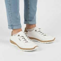 Półbuty damskie Rieker, cholewka ze skóry naturalnej gładkiej sportowa forma klasyczne sznurowanie lekka elastyczna podeszwa, białe, N42K5-80. Białe obuwie sportowe Rieker, ze skóry, bez zapięcia. Za 369.00 zł.