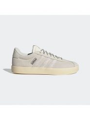 Adidas Sneakersy w kolorze kremowym rozmiar: 38,5. Brązowe trampki Adidas, bez wzorów, bez zapięcia. Za 244.95 zł.