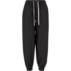 Damskie spodnie dresowe Urban Classics. Czarne spodnie dresowe Urban Classics, bez wzorów, z bawełny. Za 147.00 zł.