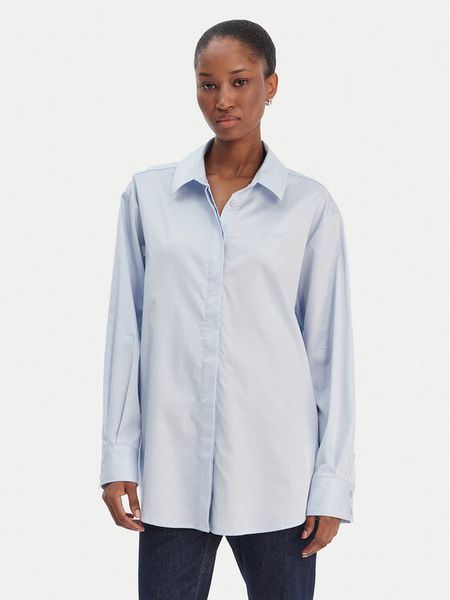 Guess Koszula W6RH57 WAF10 Błękitny Oversize. Niebieskie koszule Guess, xl, z aplikacjami, z bawełny, bez kołnierzyka, bez ramiączek. Za 399.99 zł.