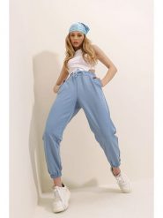 Chezalou Spodnie dresowe w kolorze błękitnym rozmiar: L. Niebieskie spodnie dresowe Chezalou, l, bez wzorów, z bawełny. Za 52.45 zł.