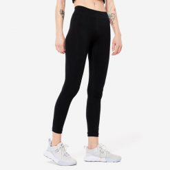 Legginsy fitness damskie Domyos slim. Czarne legginsy DOMYOS, s, bez wzorów, z bawełny. Za 49.99 zł.