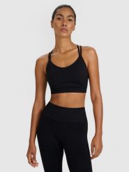 4F Biustonosz treningowy z niskim wsparciem - czarny M/L. Czarne bielizna sportowa 4f, l, bez wzorów, z elastanu. Za 119.99 zł.