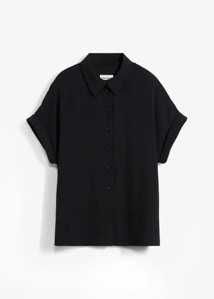 Bluzka oversized z e strukturalnej krepy. Czarne bluzki bonprix, bez wzorów, bez kołnierzyka, bez ramiączek. Za 142.99 zł.