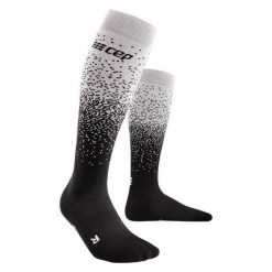 Skarpety kompresyjne damskie sportowe zimowe z wełną merino wysokie Snowfall CEP. Białe skarpety CEP, bez wzorów, z wełny. W wyprzedaży za 139.90 zł.