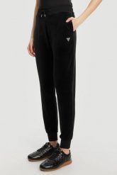 GUESS Czarne damskie spodnie dresowe Couture. Czarne spodnie dresowe Guess, s, z aplikacjami, z dresówki. W wyprzedaży za 279.99 zł.