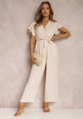 Jasnobeżowy Kombinezon z Wiskozy Zotolio. Brązowe sukienki Renee, na imprezę, na lato, m, bez wzorów, z materiału, eleganckie, bez kołnierzyka, bez ramiączek, maxi, kopertowe. Za 49.99 zł.