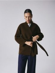 Wełniany płaszcz handmade - oliwkowy. Zielone płaszcze Reserved, l, bez wzorów, z wełny, bez kaptura. Za 499.99 zł.
