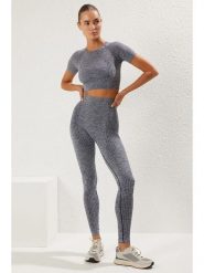 Trendyol Legginsy sportowe w kolorze szarym rozmiar: M/L. Szare legginsy Trendyol, l, bez wzorów, prążkowane, z podwyższonym stanem. Za 65.69 zł.