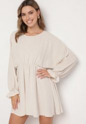 Jasnobeżowa Sukienka o Rozkloszowanym Kroju z Ozdobnymi Mankietami Terellea. Brązowe sukienki Born2be, na co dzień, bez wzorów, z jeansu, eleganckie, bez kołnierzyka, bez ramiączek, mini, kopertowe. Za 79.99 zł.