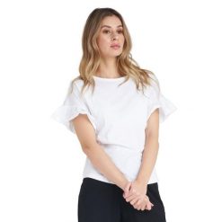 Błyszcząca damska koszulka z krótkim rękawem i falbaną. Białe bluzki LEONE 1947 APPAREL, l, bez wzorów, z tkaniny, sportowe, bez kołnierzyka, bez ramiączek. W wyprzedaży za 83.85 zł.