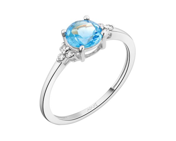 Pierścionek z białego złota z brylantami i topazem - próba 585. Białe pierścionki Apart, z brylantem, złote. Za 2,390.00 zł.