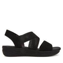 Sandały Jana. Czarne sandały JANA, bez wzorów, bez obcasa, na koturnie, bez zapięcia. Za 209.99 zł.