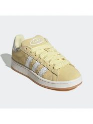 Adidas Skórzane sneakersy "Campus 00s" w kolorze żółtym rozmiar: 40. Żółte trampki Adidas, bez wzorów, bez zapięcia. Za 359.13 zł.