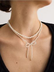 Podwójny naszyjnik z koralikami - biały. Białe naszyjniki Reserved. W wyprzedaży za 49.99 zł.