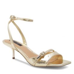 Sandały Nine West. Żółte sandały Nine West, bez wzorów, bez obcasa, na szpilce, bez zapięcia. Za 229.99 zł.