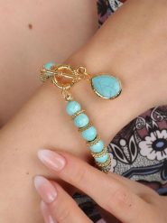 Pierres delicates Pozłacana bransoletka z turkusami rozmiar: onesize. Żółte bransoletki Pierres delicates, z turkusem, pozłacane. Za 39.99 zł.