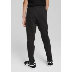 Młodzieżowe spodnie Evostripe PUMA Black. Czarna spodnie sportowe Puma, m, bez wzorów, z standardowym stanem, trekkingowe. W wyprzedaży za 124.00 zł.